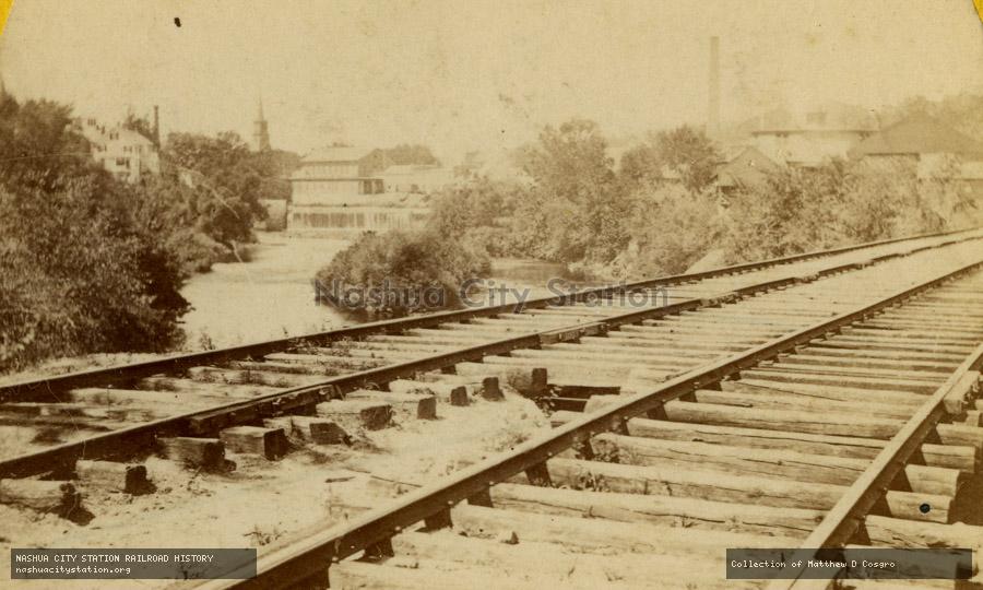 Stereoview: View up the river from the railroad bridge, Nashua, New Hampshire